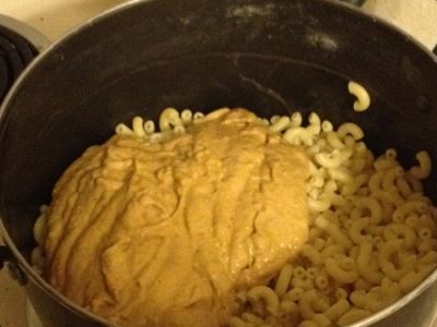 Pour Sauce Over Cooked and Drained Macaroni and Mix Together Well.
