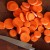 Now, start slicing the cooked carrots then add to the salad bowl of macaroni.