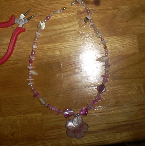 Here is the pink shell necklace I made for this project. I love this necklace because it has a Hawaiian vibe to it.