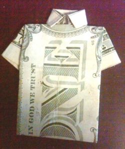 Shirt folded from one dollar bill (US $)