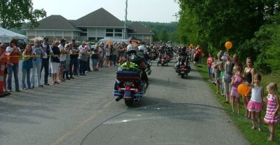The group arrives in West Virginia, and the community is along the path to the Community Center to greet us.