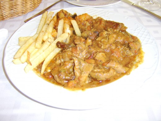 A rich, delicious kid stew, a meat which reminded me very much of mutton