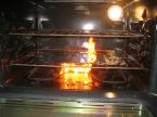 An oven catching fire