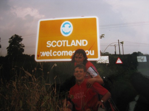 Mid way through our Land's End to John O'Groats cycle challenge...Dishevelled, and exhausted - crossing the border.  Who knew Scotland was so big?