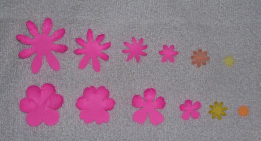These shapes have been partially contoured using a rounded 'tool' and a mousepad. The two lower petals of each one is not yet contoured.