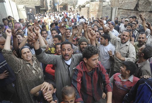 Egyptian farmers block roads to prevent government from slaughtering their pigs