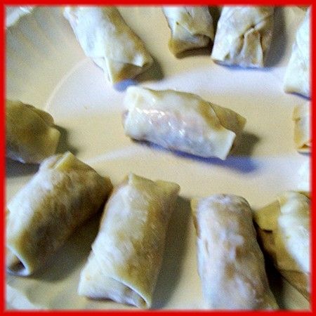 Finished raw pizza rolls ready to be deep fried.