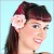 Add a touch of femininity to your retro hairdo with a floral hair clip, such as a rose Add a touch of femininity to your retro hairdo with a floral hair clip, such as a rose