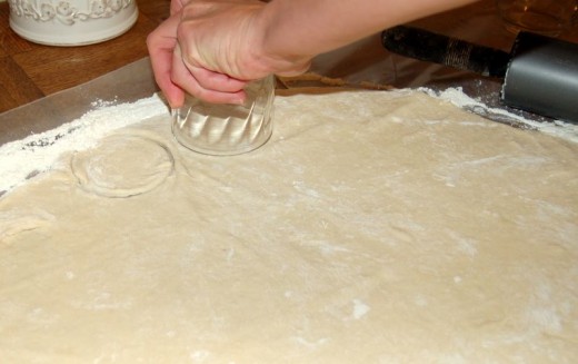 Cutting out circles to make Pierogi Dumplings