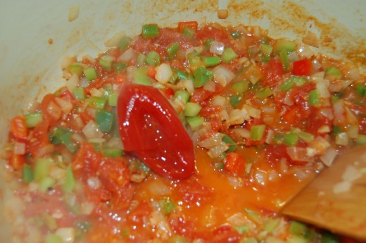 Add Garlic and Whole Tomatoes