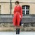 this street style is quite trendy and the light red jacket adds elegant flare to her appeal, which is topped off with a black handbag. this street style is quite trendy and the light red jacket adds elegant flare to her appeal, which is topped off with a black handbag.