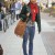 Simple street style with red scarf, business jacket and brown leather handbag with trimmings and blue jeans. Simple street style with red scarf, business jacket and brown leather handbag with trimmings and blue jeans.