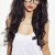 Attractive woman wearing bi focal glasses with extremely long curly black hair street style. Attractive woman wearing bi focal glasses with extremely long curly black hair street style.