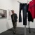 Visitor walking by laundry performance at Quint Visitor walking by laundry performance at Quint