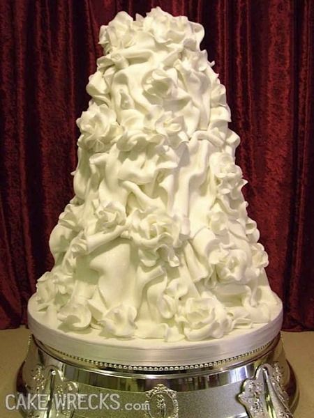 Romantic flowers on a wedding cake are so yesterday, let's go with the "cried-out-wedding-guest-tissue" look.