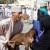 Oman women choosing a goat to buy Oman women choosing a goat to buy