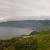 This is a panorama photograph showing the mountains along the shore on the eastern portion of the loop..