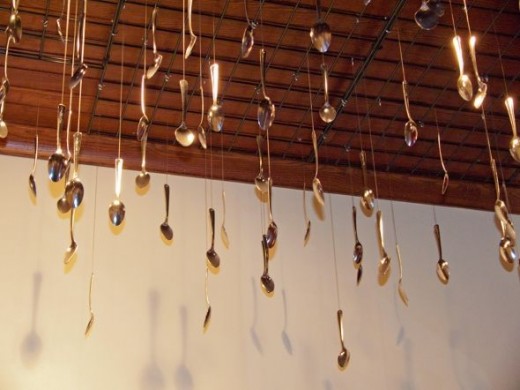 A collection of spoons adorn the museum's ceiling.