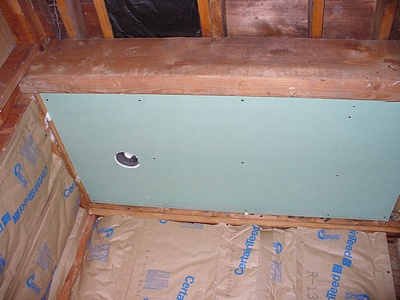 Ceiling after drywall - notice how nicely the drywall fits around the canned light - very pleased indeed