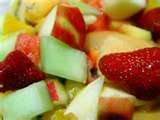 Always need pineapple, oranges, grape, strawberries, melon and apple.  Others may be added with coconut and marshmallow and perhaps sour cream.