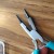 Use a good quality round nose pliers to create your new curled end. Use a good quality round nose pliers to create your new curled end.