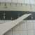 4. This is the ribbon threading jig up close. It's pointed, to slide through the small cut, and notched to hold the ribbon. 4. This is the ribbon threading jig up close. It's pointed, to slide through the small cut, and notched to hold the ribbon.