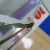 8. A pair of pointed tweezers will help you pull the ribbon through the slot. 8. A pair of pointed tweezers will help you pull the ribbon through the slot.