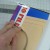 Fold your artwork into the slide jig so the slide jig completely covers it. Fold your artwork into the slide jig so the slide jig completely covers it.