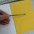 This shows the "short end" of the ribbon lined up to be taped down and hidden under the cover artwork. This shows the "short end" of the ribbon lined up to be taped down and hidden under the cover artwork.