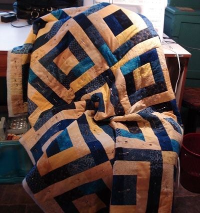 Margaret's blue and gold scrap quilt Partly quilted in this photo
