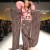 Model in a fashion show wearing modernize Kimono dress.