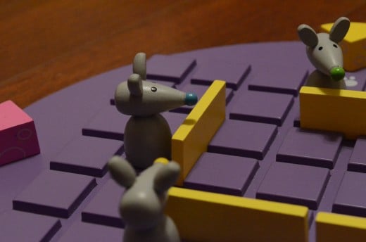 Quoridor for kids has a cute mouse and cheese theme, but it's still full of strategy!