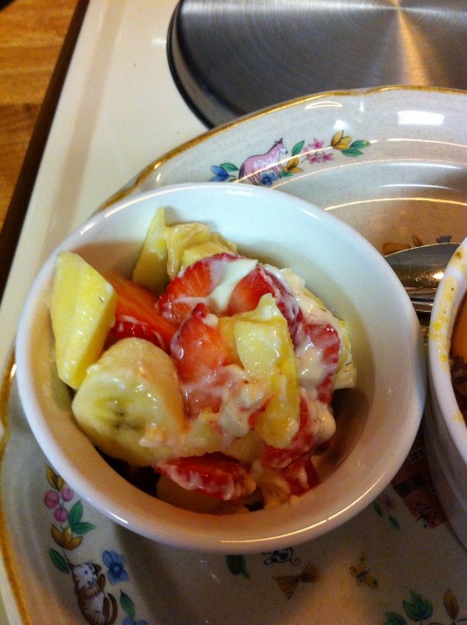 Pineapple, bananas, strawberries and apple with a yogurt or mayonnaise dressing