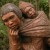 Looking into the face of this statue carved from wood, you can see sorrow on this mothers face.