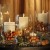 Candles and nuts in a clear glass candle holder from eleganteventdesign.com Candles and nuts in a clear glass candle holder from eleganteventdesign.com