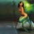 From there I select the largest - one with a small signature in the corner. Unfortunately, it's still unreadable. It now looks like a photomanipulation (there's a carving behind her, and the rock and mermaid are much more detailed than the background From there I select the largest - one with a small signature in the corner. Unfortunately, it's still unreadable. It now looks like a photomanipulation (there's a carving behind her, and the rock and mermaid are much more detailed than the background