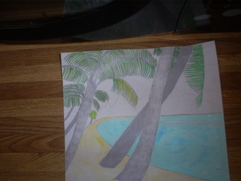 Adding color to the palm fronds.