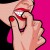 Catwoman checking on her teeth. Catwoman checking on her teeth.