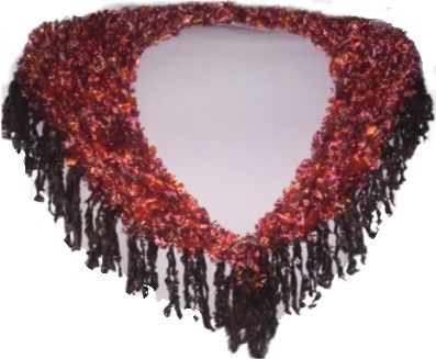 A triangular shawl hand-knitted in Autumn Rust 'Feathers' yarn with Dark Brown 'Feathers' fringing (9cm/3.5" long), up to 90cm (35") maximum width around shoulders x 30cm (12") maximum depth at back point, and  clasp covered with crocheted sparkly go