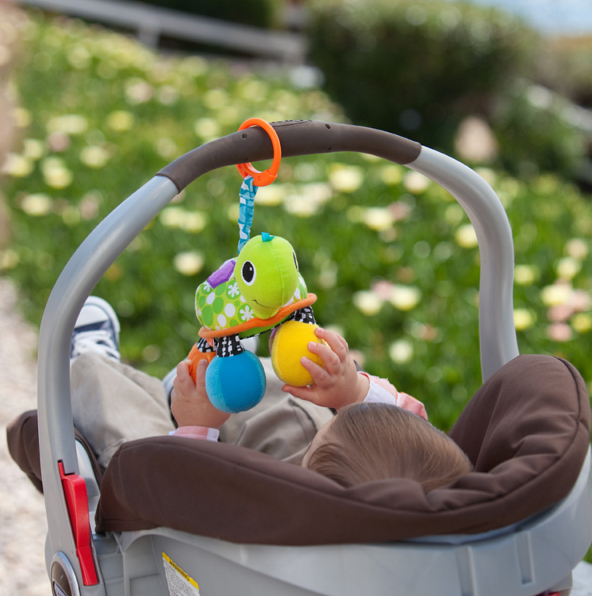 Take Topsy to the park or anywhere by attaching it to a stroller or car seat for hours of fun.