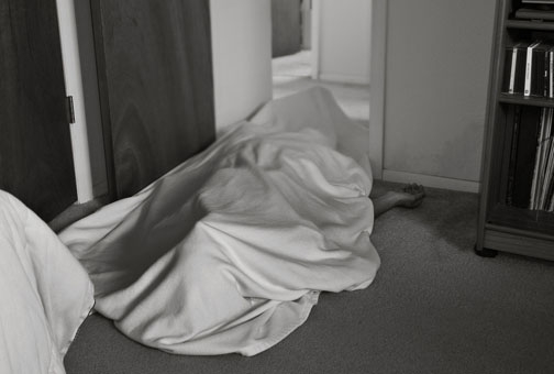 Body Covered With Sheet (Photo by Daniel Oines / flickr.)