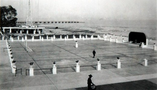 The open air dance floor was right on the shoreline, overlooking the lake. Notice the bandshell at the far right of the picture, the Circle Swing and pier in the background.
