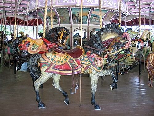 My favorite carousel horse, seen here, is on Idlewild's carousel. The ride is accompanied by a Wurlitzer #103 calliola. The carousel is a historic landmark.