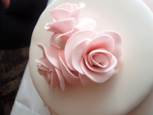 Pale pink roses wedding cake topper, made from flower paste