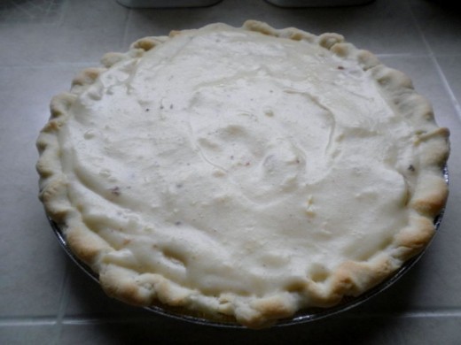 The Banana Cream pie already in shell ready to be topped with Meringue.