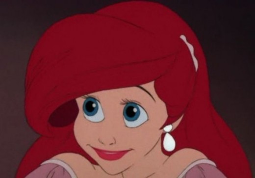 Gathering of sleeves at shoulder, bright red lipstick, and jewellery detail