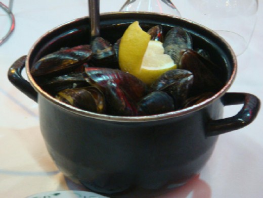 BEFORE: Mussels ready to be eaten. I never knew before visiting that mussels are a typical dish in Belgium.
