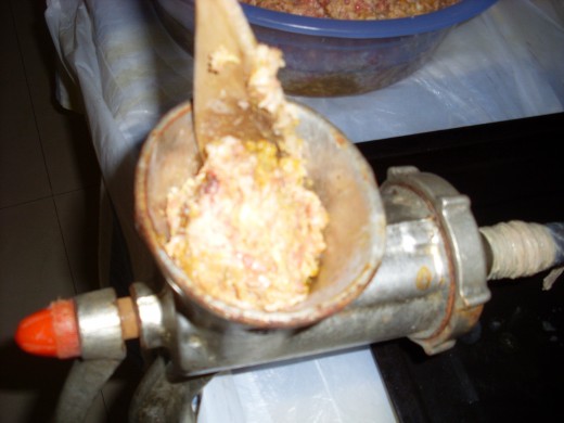 Mince in the funnel you put the mince into.  Heck, I don't know what it's called!