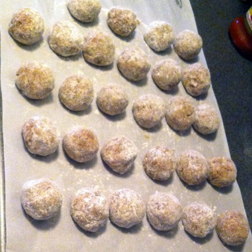 Meatballs rolled and floured (28 tottal!)