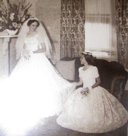 who were modest little ladies, were busily posing for photos.